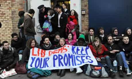 student protesters outside simon hughes office