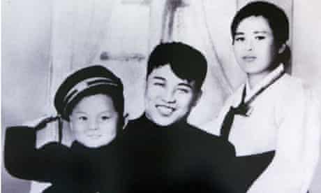 Kim Jong-il with his father Kim Il-Sung and mother Kim Jong-suk