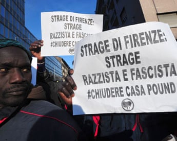 Marchers protesting about the killings of two Senegalese men in Florence