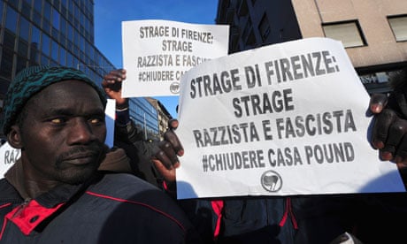 Marchers protesting about the killings of two Senegalese men in Florence