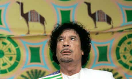 Libyan leader Muammar Gaddafi attends a news conference in a tent in Kiev
