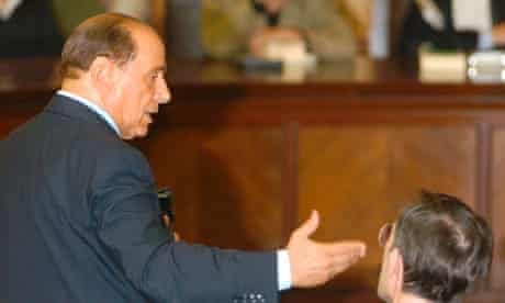 Italian Premier Silvio Berlusconi addresses a court