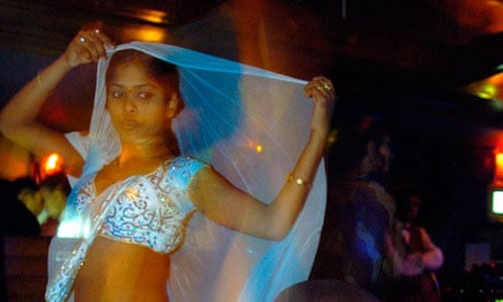 A young women at one of Mumbai’s infamous dance bars.