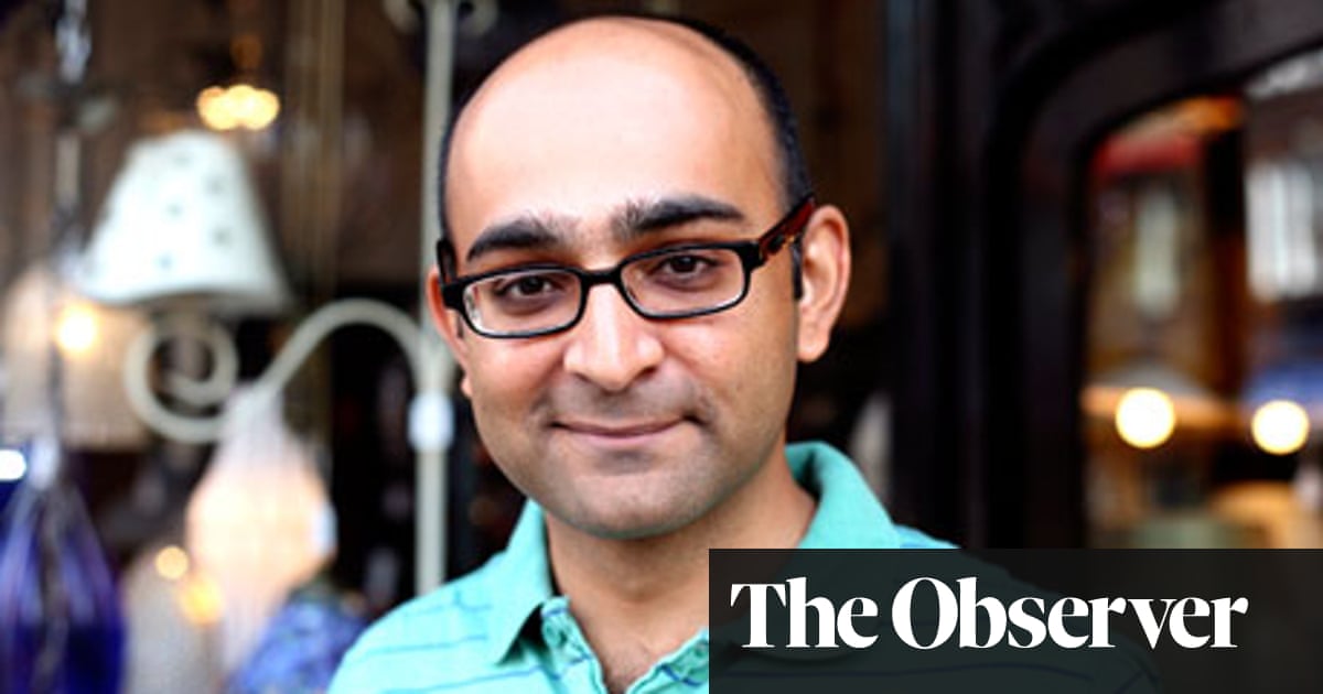 Mohsin Hamid in a thoughtful pose