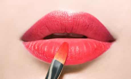 Applying red lipstick ask hadley valentine's day
