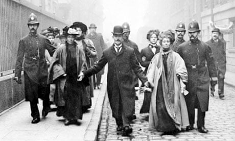 Emmeline Pankhurst is arrested and escorted away by police officers circa 1910