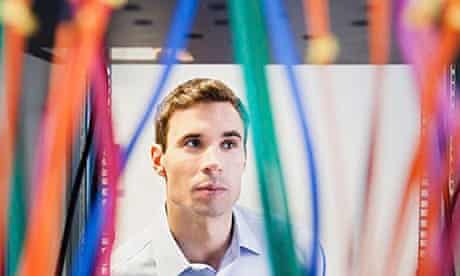 Young man in server room