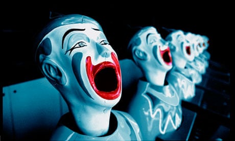 Laughing clowns at a funfair