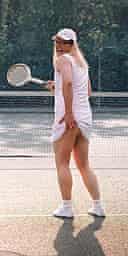 Alan Carr as the tennis girl