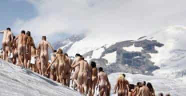 Naked volunteers pose for Spencer Tunick in the Swiss glacier of Aletsch