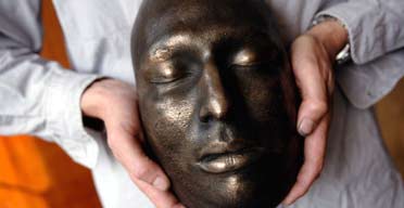 Nick Reynolds with the death mask of Jonjo Amamdor 