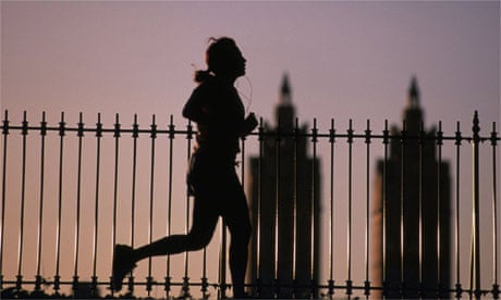A woman running to music