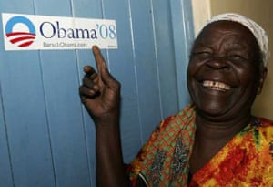  U.S. Democratic Party presidential candidate Barack Obama's grandmother, Sarah Hussein Onyango Obama, shows a campaign poster inside her house at the family's ancestral home in Kogelo, a village west of Nairobi January 8, 2008