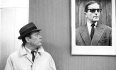 Shades of Orwell … Eddie Constantine (left) as Lemmy Caution in Alphaville (1965).