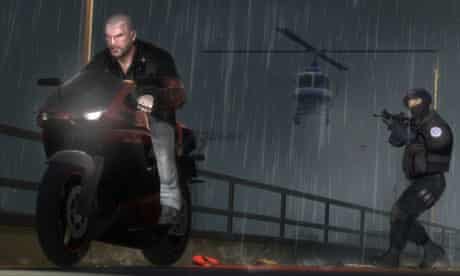 A man steals a motorbike in Grand Theft Auto