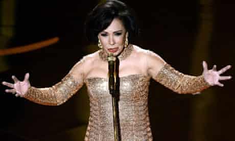 Shirley Bassey performs on stage at the Oscars