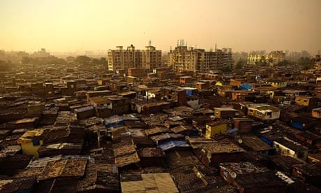 The sun sets over Dharavi slum in Mumbai, India.