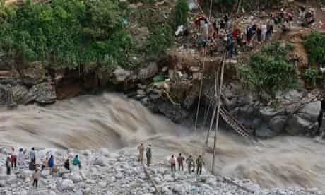 Soldiers repair bridge over River Alaknanda Uttarakhand