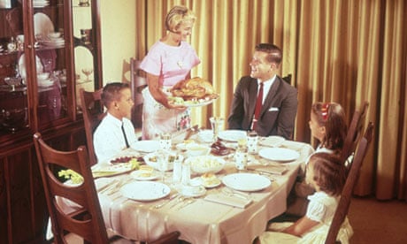An An American family having Thanksgiving dinner in 1962