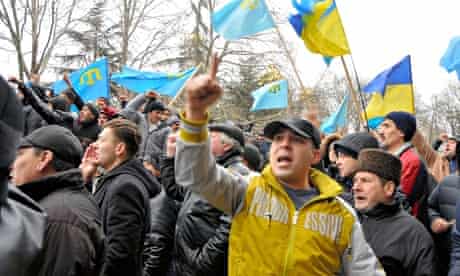 Crimean Tatar Protest Against Pro Russia Demonstrators Occupation of Crimean Assembly