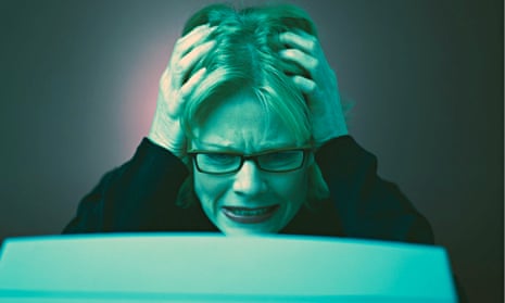 Frustrated Businesswoman Using a Computer