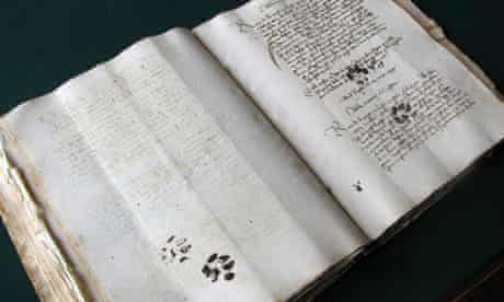 Pawprints on manuscript