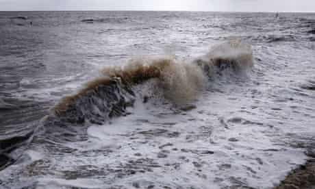 Waves crash onto a beach