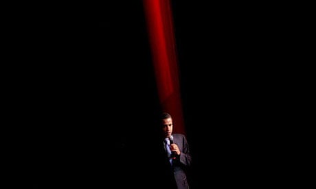 Obama glimpsed through the curtain at a Harlem Apollo fundraiser