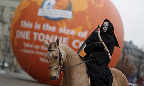A climate activist dressed as a horseman of the Apocalypse 