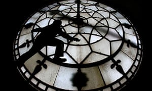 Horologist at work inside Manchester Town Hall's clockface