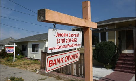 For-sale sign outside a bank-owned home in California