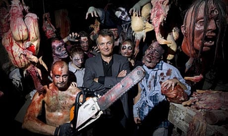 Charlie Higson surrounded by zombies