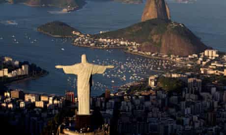 The statue of Christ looms over Rio de Janeiro.