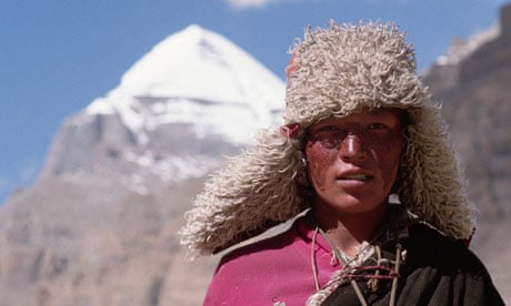 A Tibetan Pilgrim with the sacred mountain Kailas in the background