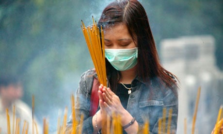 A Hong Kong Resident Wears A Mask 