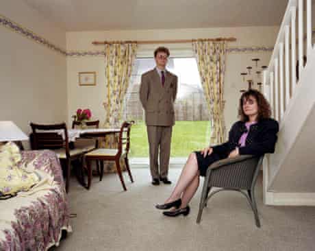 A couple in their suburban home, from Martin Parr's album Signs of the Times, England, 1991
