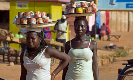 African girls sell coffee in Ouagadougou, Burkina Faso
