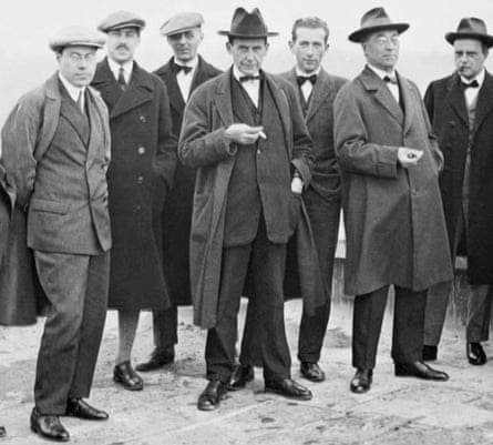 Walter Gropius poses on the roof of the Bauhaus building with other teaching staff in 1926