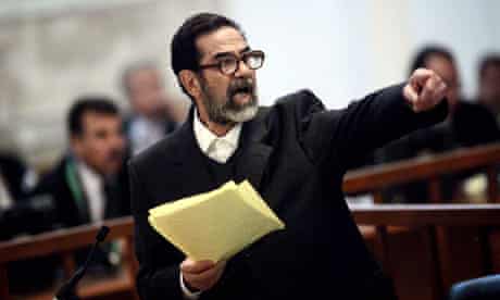Saddam Hussein, on trial for crimes against humanity, argues with prosecutors in Baghdad, 2006