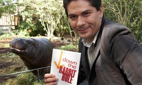 Guardian first book award nominee Juan Pablo Villalobos with a copy of Down the Rabbit Hole