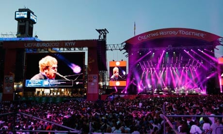 Elton John performs at a charity concert dedicated to the fight against HIV/Aids in Kiev