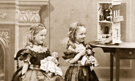 Victorian girls playing with dolls