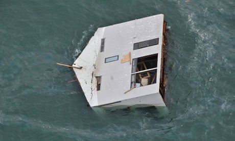 A house adrift off the coast of north eastern Japan following the earthquake and tsunami