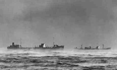 A convoy of ships passes through Arctic fog in 1945