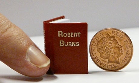 Reading the small print … a miniscule book of Robert Burns poems, which features in the exhibition.