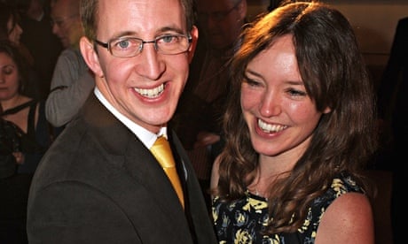 Nathan Filer celebrates with his wife, Emily, following the Costa book awards gala in London
