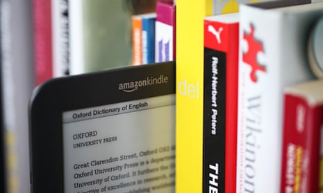 Amazon's Kindle and real books on a shelf
