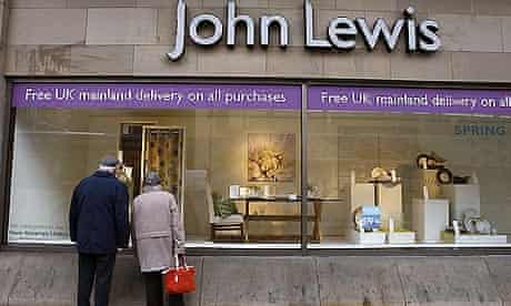 A couple look into the window of a John Lewis store in Edinburgh, Scotland