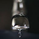 A tap drips water. Photograph: Christopher Furlong/Getty