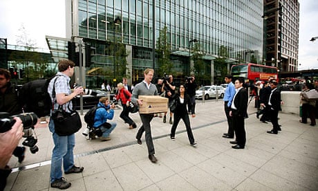 Lehman Brothers employees leaving the Canary Wharf building. Photograph: Graeme Robertson